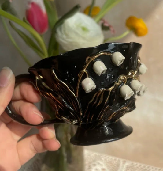 Handmade ceramic black gold lily of the valley tea cup