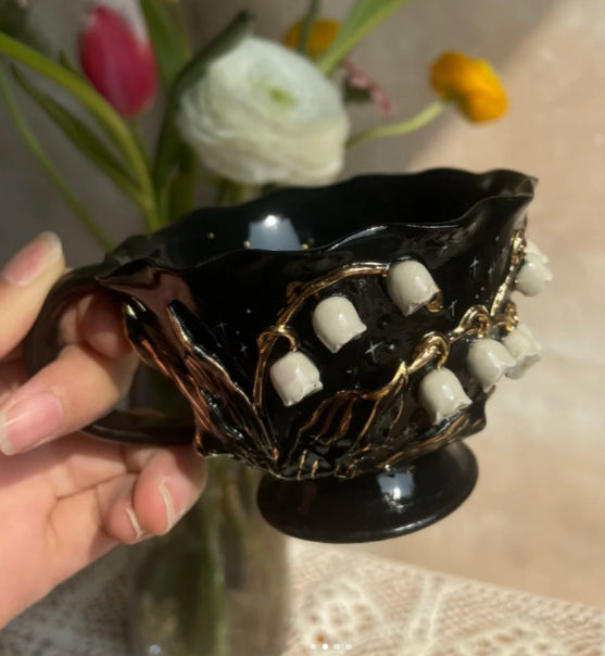 Handmade ceramic black gold lily of the valley tea cup